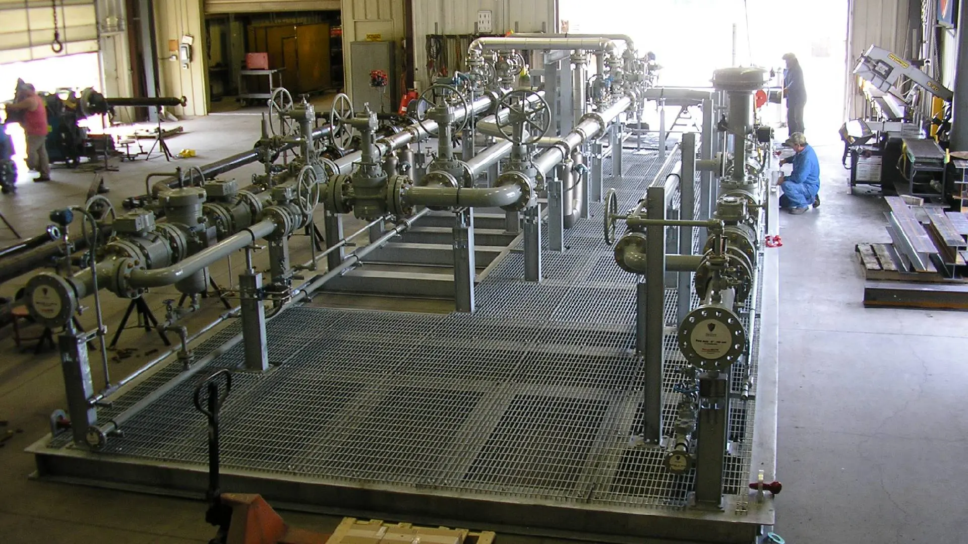 A large metal platform with pipes and valves.